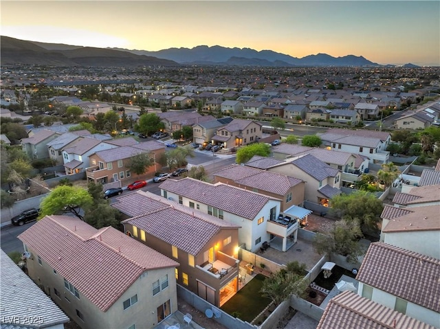 6546 American Flower St, Las Vegas, NV 89148 - aerial view at dusk of a residential view and a mountain view