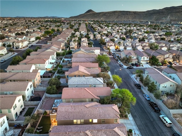 6546 American Flower St, Las Vegas, NV 89148 - aerial perspective of suburban area with a mountainous background