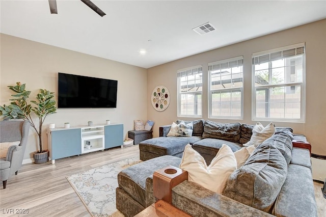 1425 Overseer Ave, Henderson, NV 89074 - living room featuring plenty of natural light, light wood-style floors, ceiling fan, baseboards, and recessed lighting