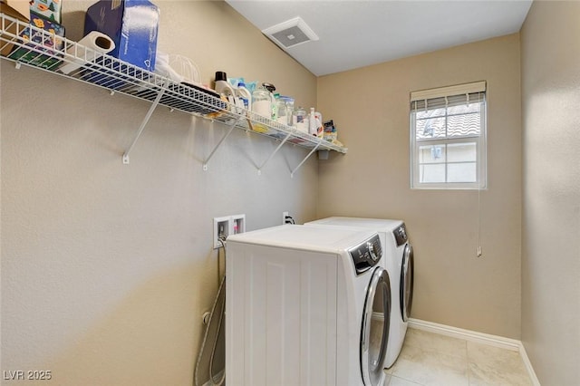 1425 Overseer Ave, Henderson, NV 89074 - washroom featuring independent washer and dryer, baseboards, and light tile patterned floors