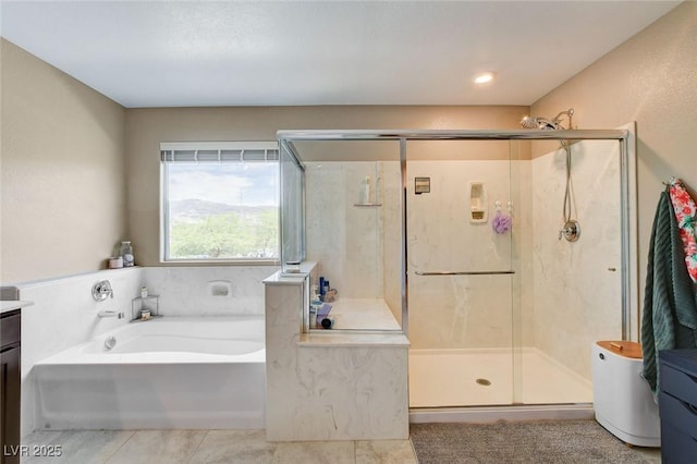 1425 Overseer Ave, Henderson, NV 89074 - full bathroom featuring a garden tub, vanity, a stall shower, and tile patterned flooring