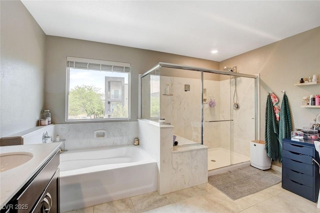 1425 Overseer Ave, Henderson, NV 89074 - bathroom featuring vanity, a bath, a stall shower, and tile patterned flooring