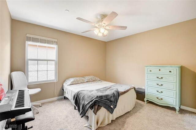 1425 Overseer Ave, Henderson, NV 89074 - bedroom with light colored carpet, baseboards, and ceiling fan
