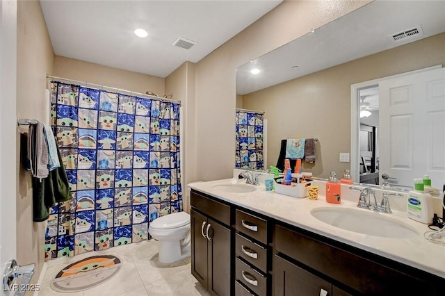 1425 Overseer Ave, Henderson, NV 89074 - bathroom with toilet, tile patterned floors, double vanity, curtained shower, and recessed lighting