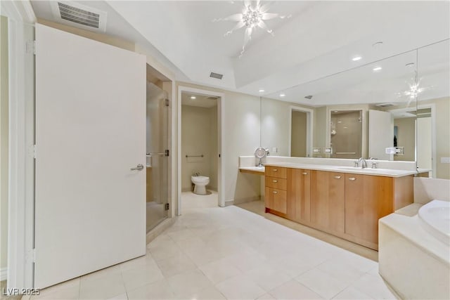 2777 Paradise Rd Unit 2001, Las Vegas, NV 89109 - bathroom featuring a shower stall, vanity, a bath, tile patterned flooring, and recessed lighting