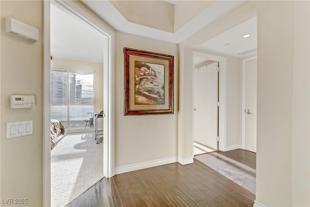 2777 Paradise Rd Unit 2001, Las Vegas, NV 89109 - corridor with dark wood-style flooring, baseboards, and recessed lighting
