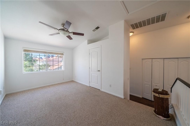 5256 Harvest Breeze Rd, Las Vegas, NV 89118 - unfurnished bedroom featuring carpet flooring, baseboards, ceiling fan, vaulted ceiling, and a closet