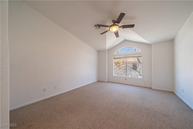 5256 Harvest Breeze Rd, Las Vegas, NV 89118 - spare room featuring lofted ceiling, light colored carpet, a ceiling fan, and baseboards