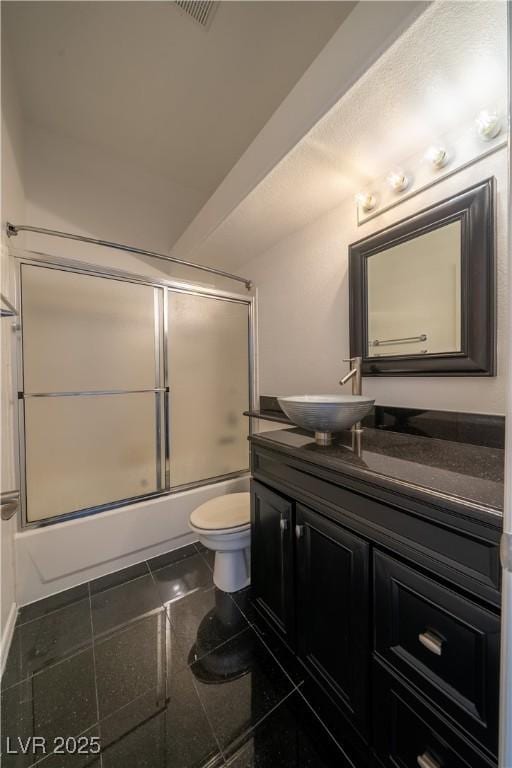 5256 Harvest Breeze Rd, Las Vegas, NV 89118 - full bath with vanity, enclosed tub / shower combo, toilet, and tile patterned floors