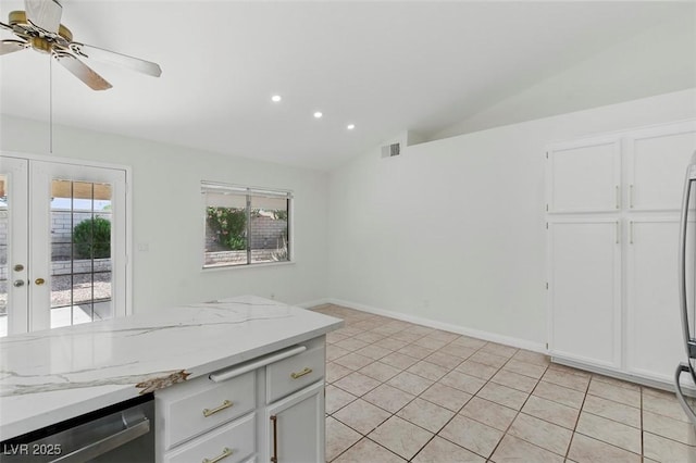 9116 Cypress Point Way, Las Vegas, NV 89117 - kitchen with lofted ceiling, stainless steel dishwasher, recessed lighting, ceiling fan, and light tile patterned floors