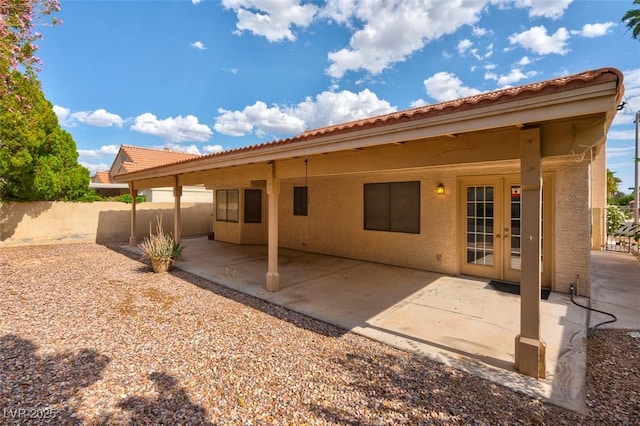 9116 Cypress Point Way, Las Vegas, NV 89117 - back of house with french doors, stucco siding, a patio area, and a tiled roof
