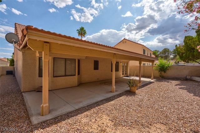 9116 Cypress Point Way, Las Vegas, NV 89117 - back of house featuring stucco siding, cooling unit, and a patio