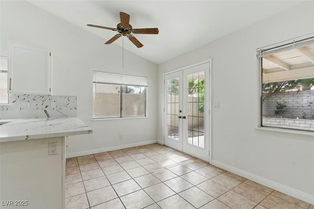 9116 Cypress Point Way, Las Vegas, NV 89117 - unfurnished dining area with vaulted ceiling, french doors, ceiling fan, baseboards, and light tile patterned floors