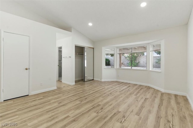 9116 Cypress Point Way, Las Vegas, NV 89117 - unfurnished bedroom with light wood-style flooring, vaulted ceiling, baseboards, and recessed lighting