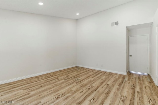 9116 Cypress Point Way, Las Vegas, NV 89117 - unfurnished room with light wood finished floors, recessed lighting, and baseboards