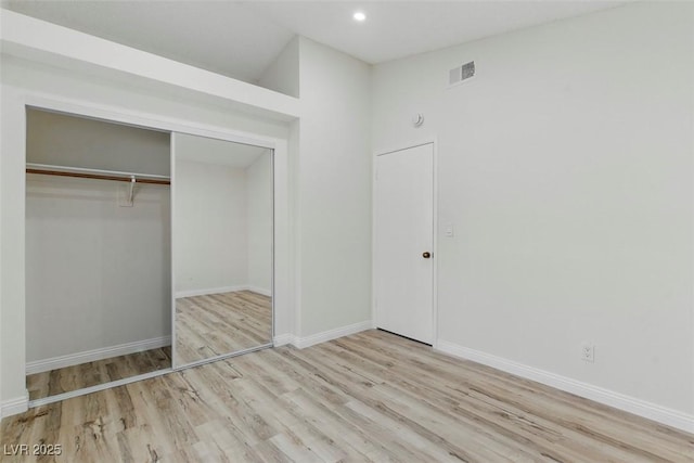 9116 Cypress Point Way, Las Vegas, NV 89117 - unfurnished bedroom featuring wood finished floors, a closet, recessed lighting, and baseboards