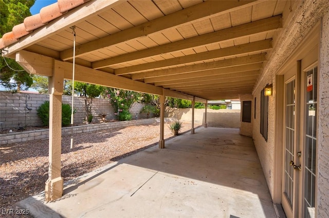 9116 Cypress Point Way, Las Vegas, NV 89117 - fenced backyard with french doors and a patio