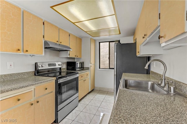 4391 Gannet Cir Unit 16, Las Vegas, NV 89103 - kitchen featuring stainless steel appliances, under cabinet range hood, a sink, light tile patterned floors, and light countertops