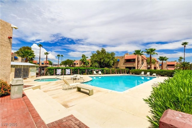 4391 Gannet Cir Unit 16, Las Vegas, NV 89103 - community pool featuring a hot tub and a patio area