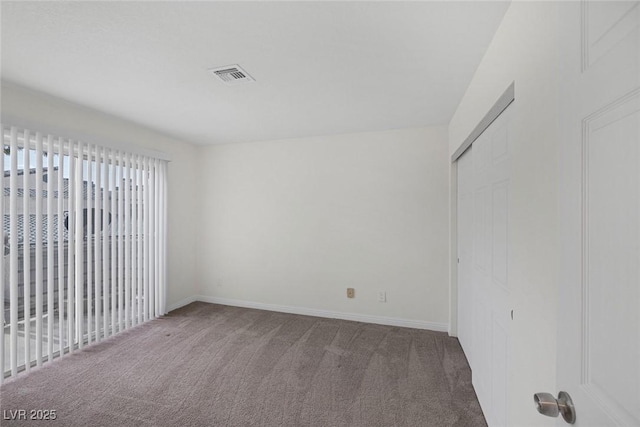 6250 W Flamingo Rd Unit 51, Las Vegas, NV 89103 - unfurnished bedroom with carpet floors, baseboards, and a closet