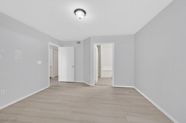4400 W Lake Mead Blvd Unit 101, Las Vegas, NV 89108 - spare room with light wood-style flooring and baseboards