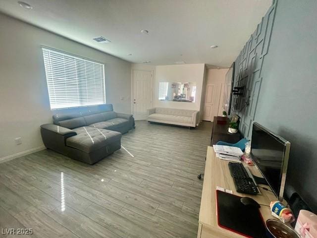 3447 SW Covilha Ln, Henderson, NV 89044 - living area featuring wood finished floors and baseboards