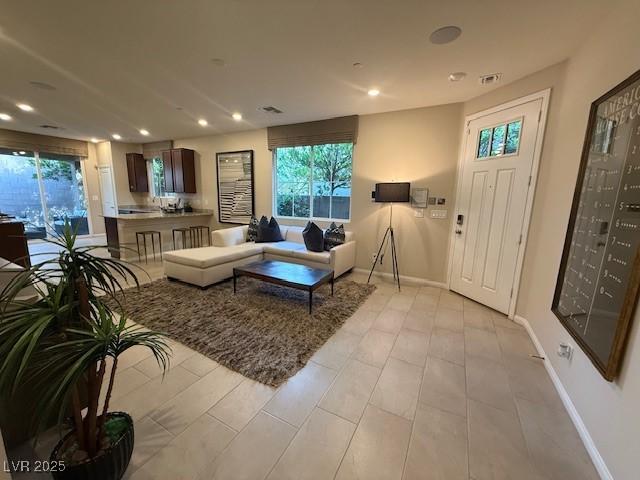 3447 SW Covilha Ln, Henderson, NV 89044 - living area with plenty of natural light, recessed lighting, and baseboards