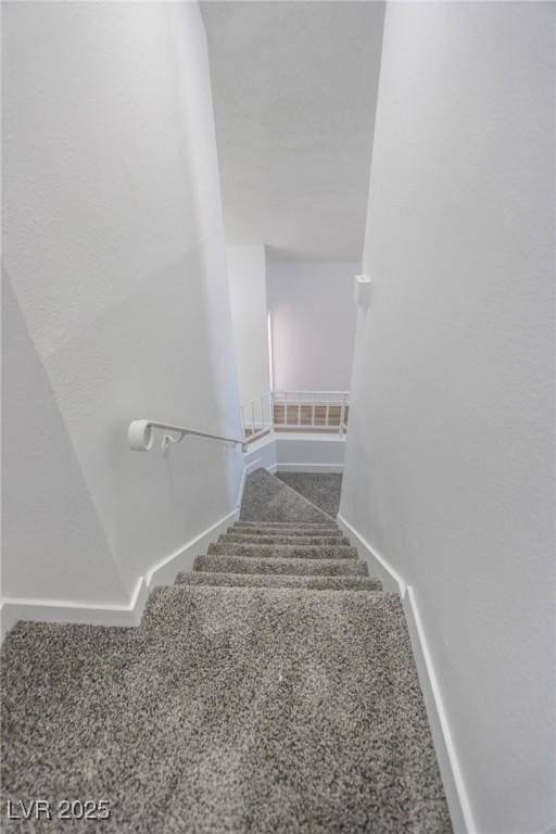 2711 Sesame Dr, Las Vegas, NV 89142 - staircase with carpet and baseboards