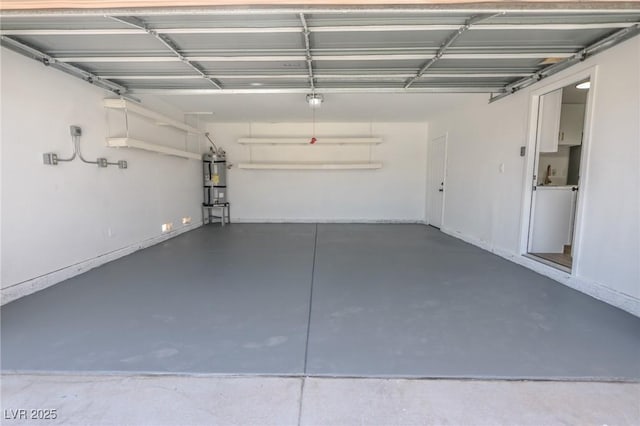 2711 Sesame Dr, Las Vegas, NV 89142 - garage with strapped water heater