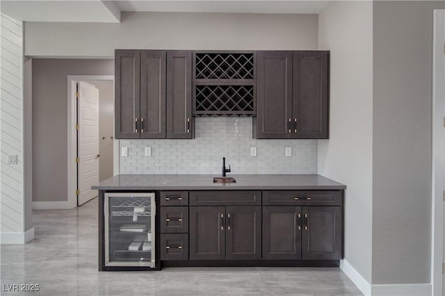 2650 Underbrush Ave, Pahrump, NV 89048 - bar area featuring beverage cooler and tasteful backsplash