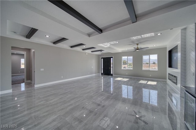 2650 Underbrush Ave, Pahrump, NV 89048 - unfurnished living room with ceiling fan, beamed ceiling, and recessed lighting