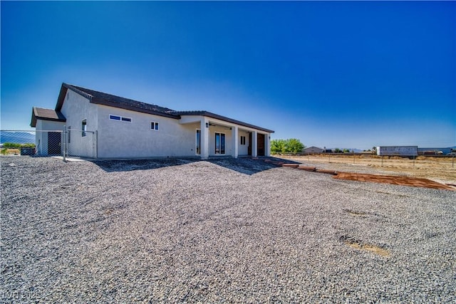 2650 Underbrush Ave, Pahrump, NV 89048 - view of front of home with stucco siding