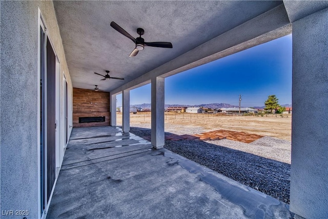 2650 Underbrush Ave, Pahrump, NV 89048 - view of patio / terrace with ceiling fan and a mountain view