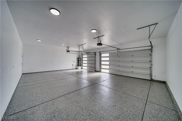 2650 Underbrush Ave, Pahrump, NV 89048 - garage with a garage door opener and water heater