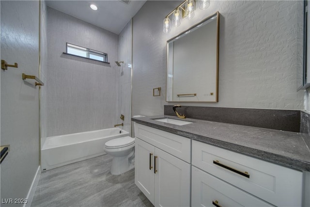 2650 Underbrush Ave, Pahrump, NV 89048 - bathroom with vanity, bathtub / shower combination, wood finished floors, and a textured wall