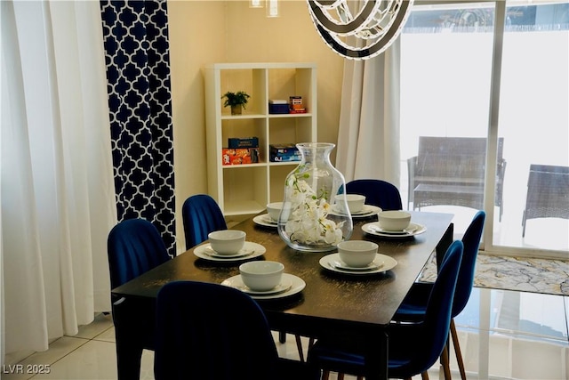 2659 Vegas Valley Dr, Las Vegas, NV 89121 - dining space with a chandelier and light tile patterned floors