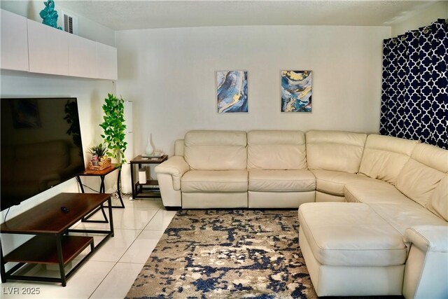 2659 Vegas Valley Dr, Las Vegas, NV 89121 - living room with light tile patterned flooring