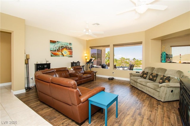 2106 King Mesa Dr, Henderson, NV 89012 - living area with a ceiling fan, baseboards, and wood finished floors