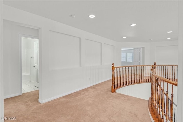 3689 Bufflehead St, Las Vegas, NV 89122 - hallway with an upstairs landing, carpet, recessed lighting, and baseboards