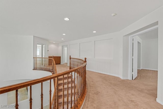 3689 Bufflehead St, Las Vegas, NV 89122 - hall featuring an upstairs landing, light colored carpet, and recessed lighting
