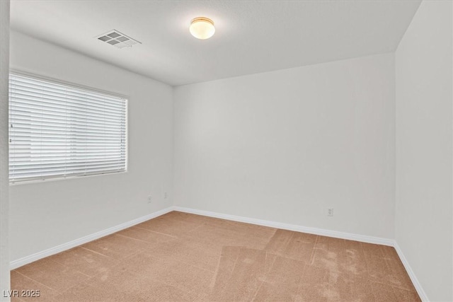 3689 Bufflehead St, Las Vegas, NV 89122 - spare room featuring light carpet and baseboards