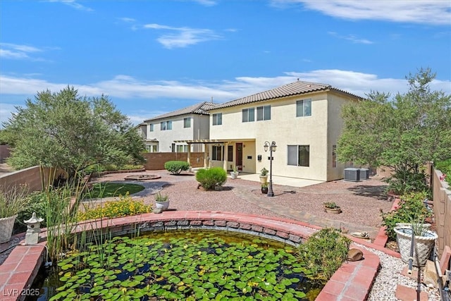 3689 Bufflehead St, Las Vegas, NV 89122 - back of property with a patio area, stucco siding, and central AC unit