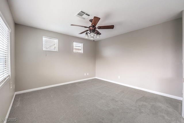 3725 Moonshine Falls Ave, North Las Vegas, NV 89085 - unfurnished room featuring dark carpet, baseboards, and ceiling fan