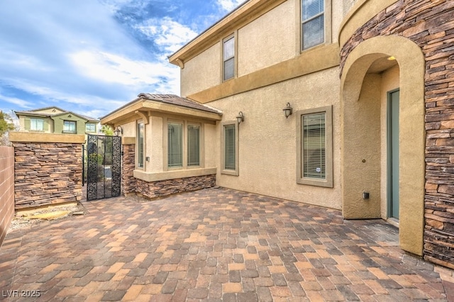 3725 Moonshine Falls Ave, North Las Vegas, NV 89085 - view of patio / terrace featuring a gate
