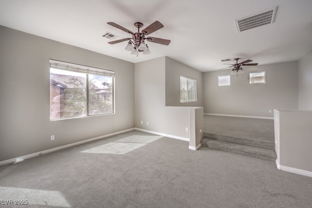 3725 Moonshine Falls Ave, North Las Vegas, NV 89085 - spare room featuring carpet floors, ceiling fan, and baseboards
