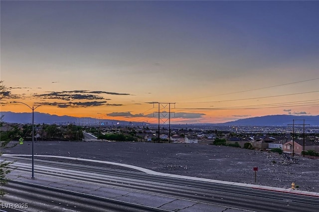 672 Solitude Point Ave, Henderson, NV 89012 - yard at dusk with a mountain view