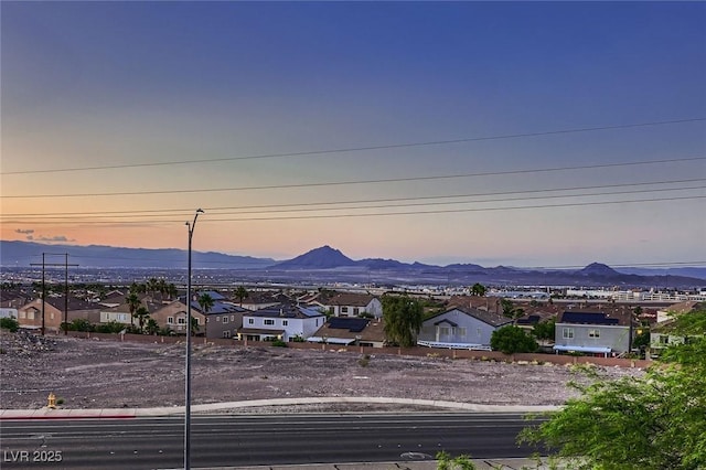 672 Solitude Point Ave, Henderson, NV 89012 - view of mountain backdrop featuring nearby suburban area