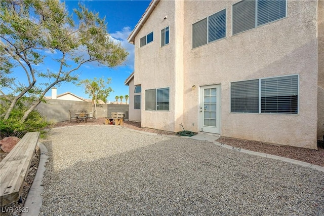 7528 Golden Yucca Dr, Las Vegas, NV 89147 - back of property featuring stucco siding, a fenced backyard, and a patio