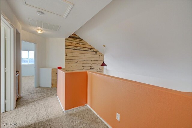 7528 Golden Yucca Dr, Las Vegas, NV 89147 - corridor featuring an upstairs landing, wood walls, carpet floors, and lofted ceiling