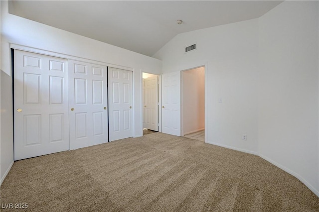 7528 Golden Yucca Dr, Las Vegas, NV 89147 - unfurnished bedroom featuring carpet, vaulted ceiling, and a closet